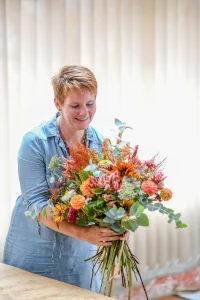 marie Barcque fleuriste souriante